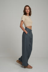 A Side View of Natural Tailored Work Pants by LILYA