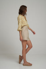 Side View of Natural Linen Tailored Shorts