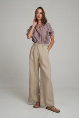 A Model Wearing Natural Linen Tailored Pants