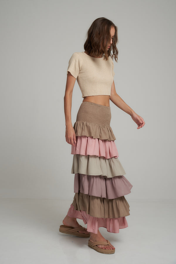 A Model Wearing a Layered Multi Coloured Maxi Skirt in Australia