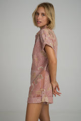 Side view of a pink floral playsuit by LILYA