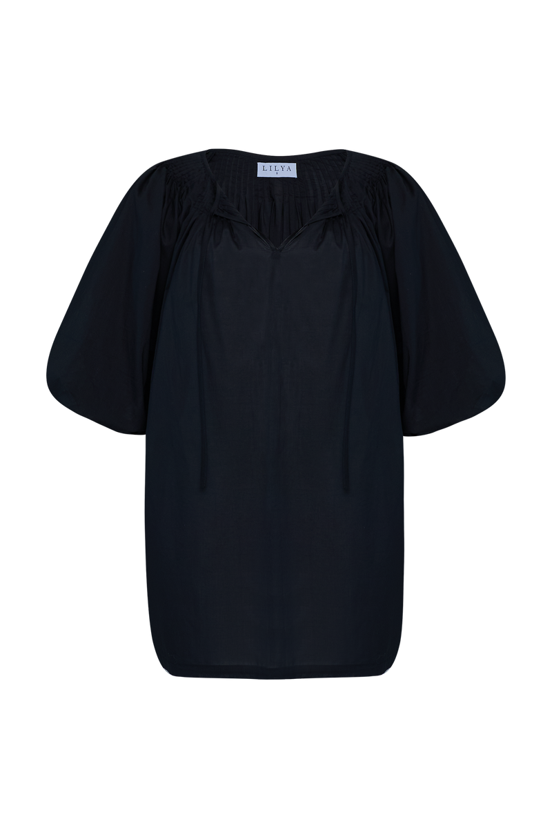 An image of a black cotton mini dress