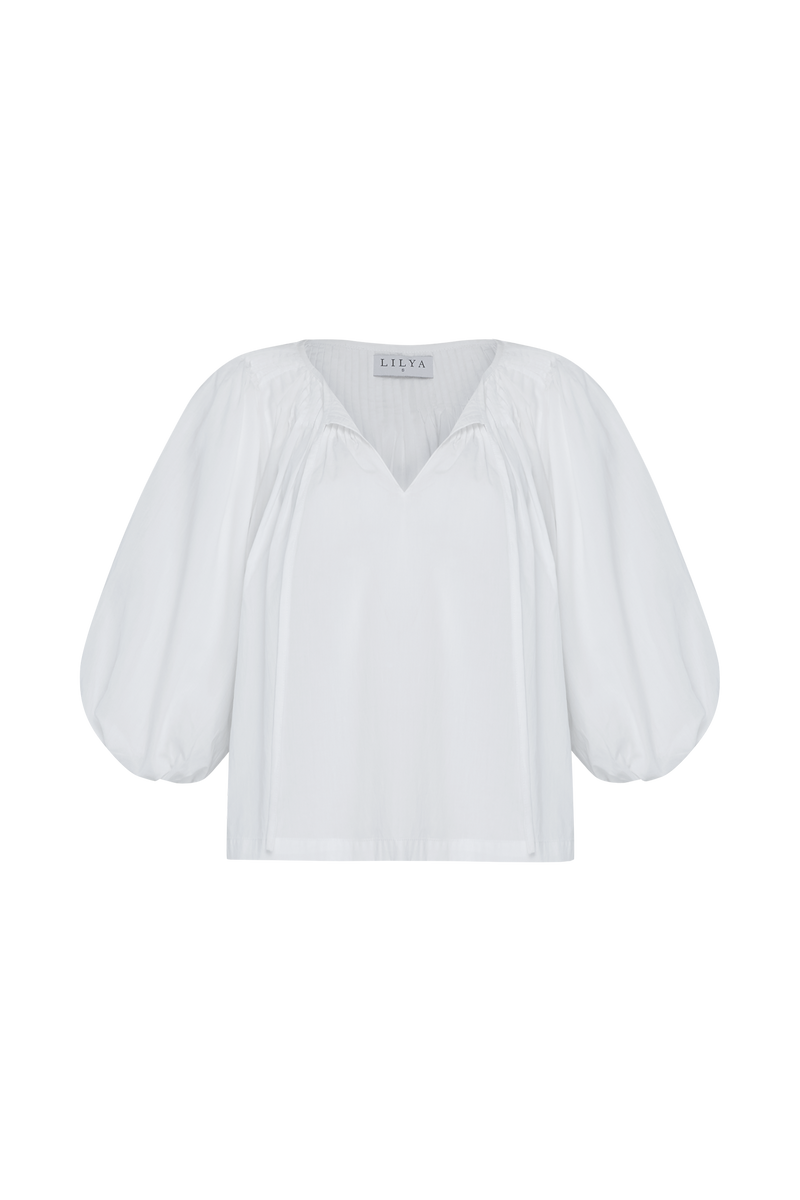 An image of a casual white cotton top