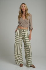 A model wearing casual green soft rayon pants