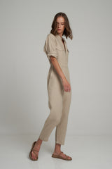 A Model Wears a Natural Linen Casual Jumpsuit
