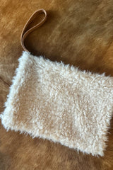Fluffy faux fur stylish clutch with leather handle