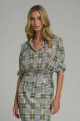 A model wearing a casual cotton check top