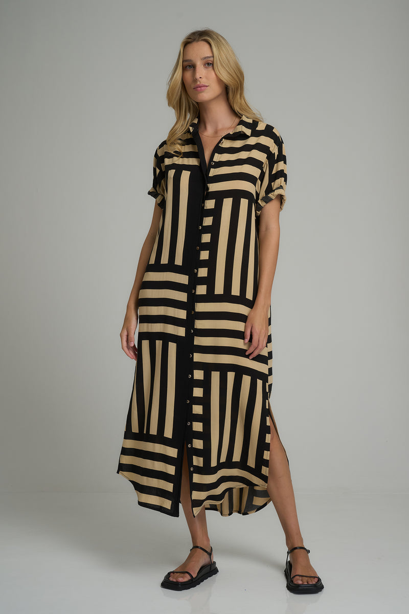 A woman wearing the Hutton Dress Oxford Block Black/Chai by LILYA