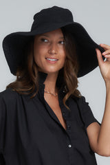 A Model Wearing a Black Cotton Canvas Hat by LILYA