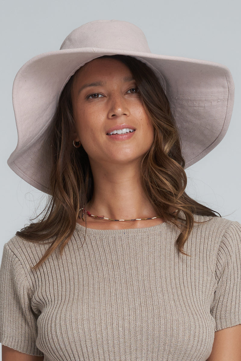 Model Wearing a Pink Summer Bucket Hat in Australia