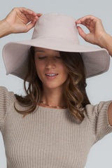 A Model Wearing a Pink Summer Beach Hat by LILYA