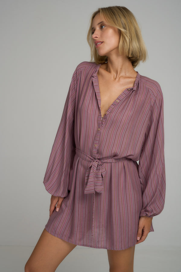 A model wearing a lilac stripe mini shirt dress