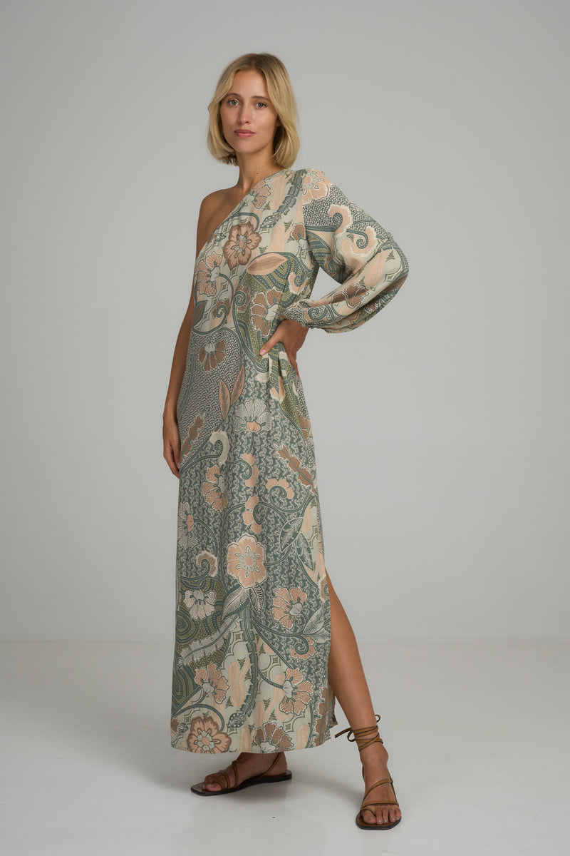 A model wearing a green batik print maxi summer dress