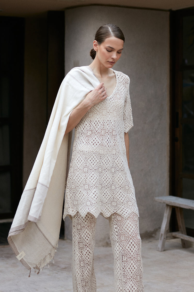 A woman wearing natural cotton lace pants in Australia