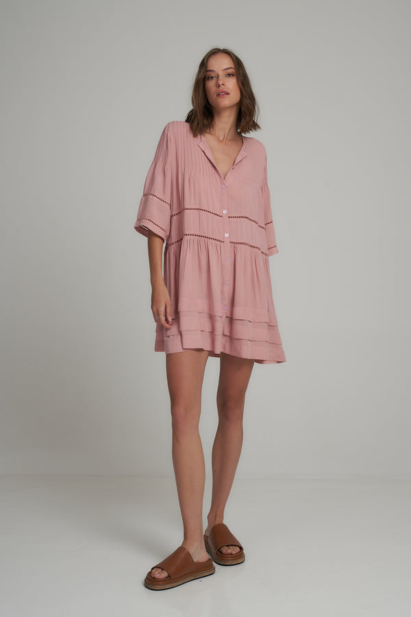 A Model Wearing a Pink Mini Summer Dress