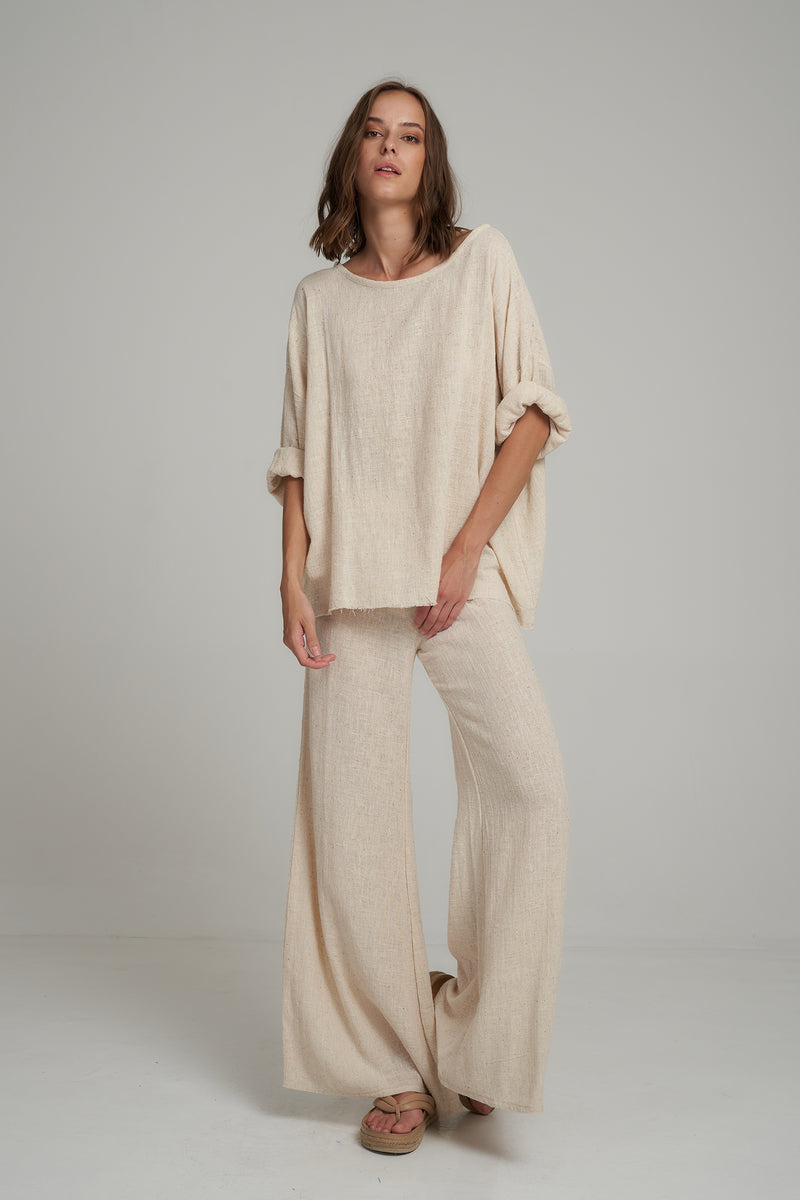 A Woman Wearing a Natural Linen Casual Top