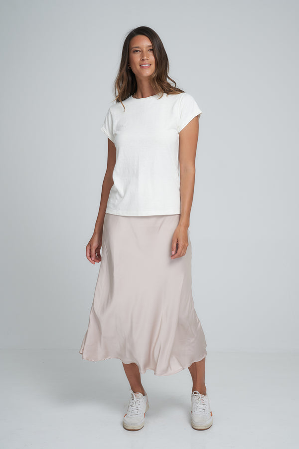 A Woman Wearing a White Silk Skirt by -LILYA