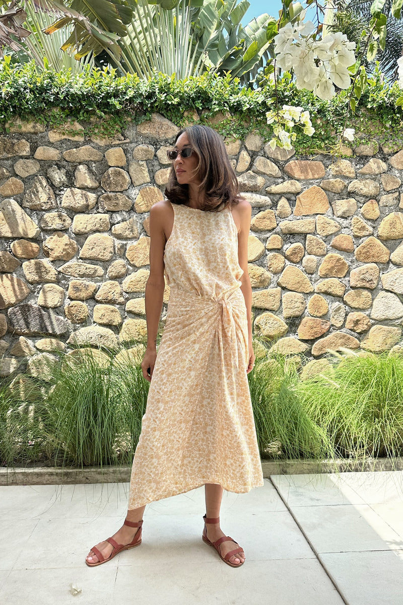 A model wearing a summer wrap dress