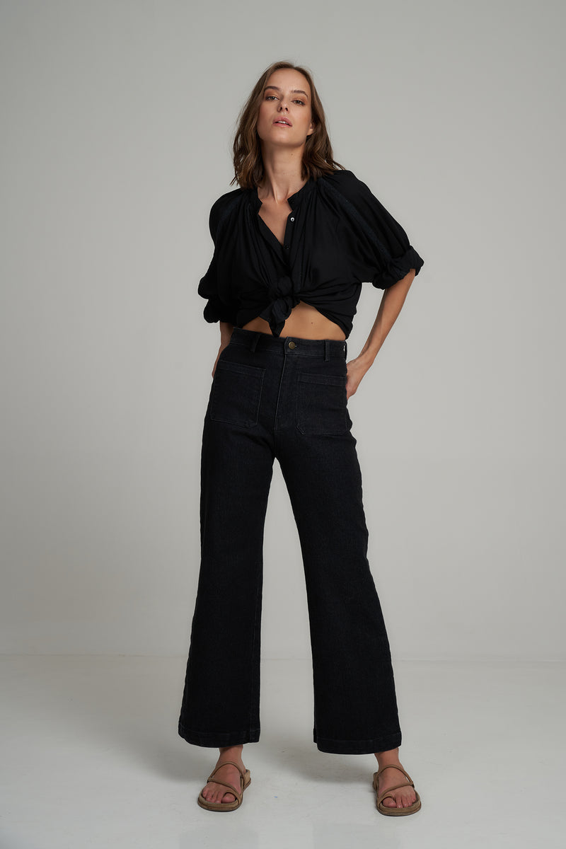 A Woman Wearing a Black Retro Denim Jeans by LILYA
