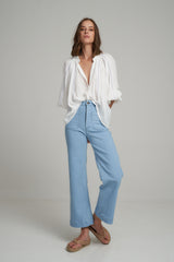 A Woman Wearing a Light Blue Summer Denim Jeans