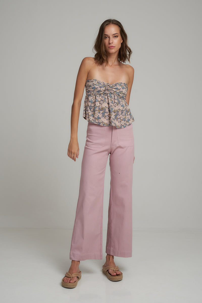 A Woman Wearing Pink High Waisted Cotton Pants