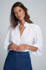 A Woman Wearing a White Cotton Embroidery Top