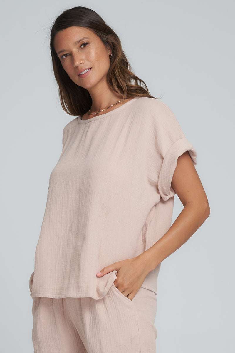A Woman Wearing a Casual Light Pink Top by LILYA