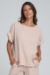 A Model Wearing a Light Pink Casual Top