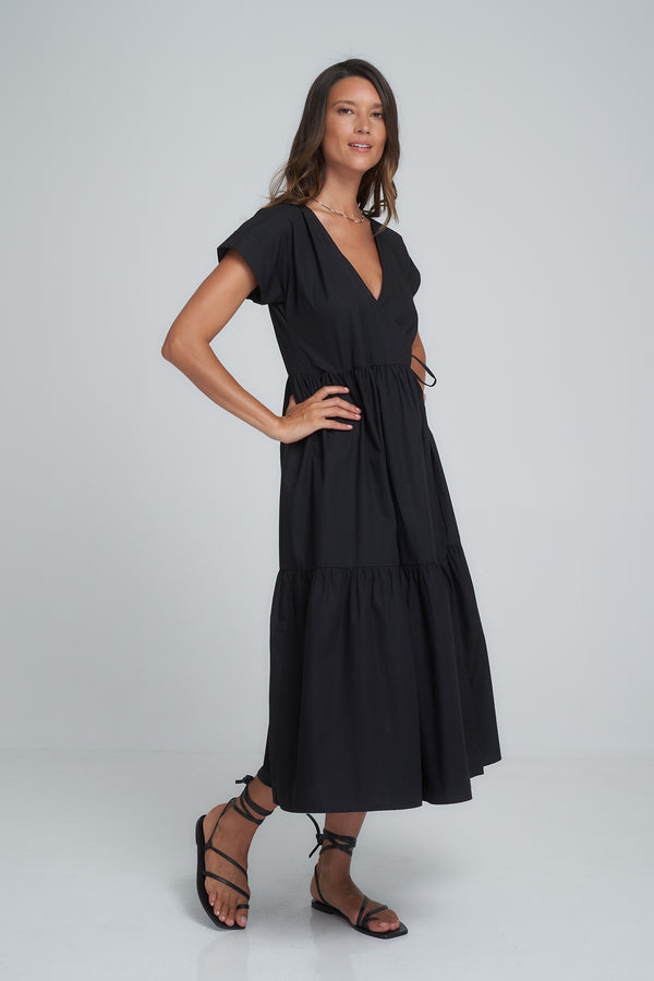 A Woman Wearing a black cotton maxi dress
