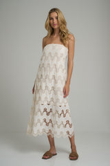 A strapless ivory lace dress