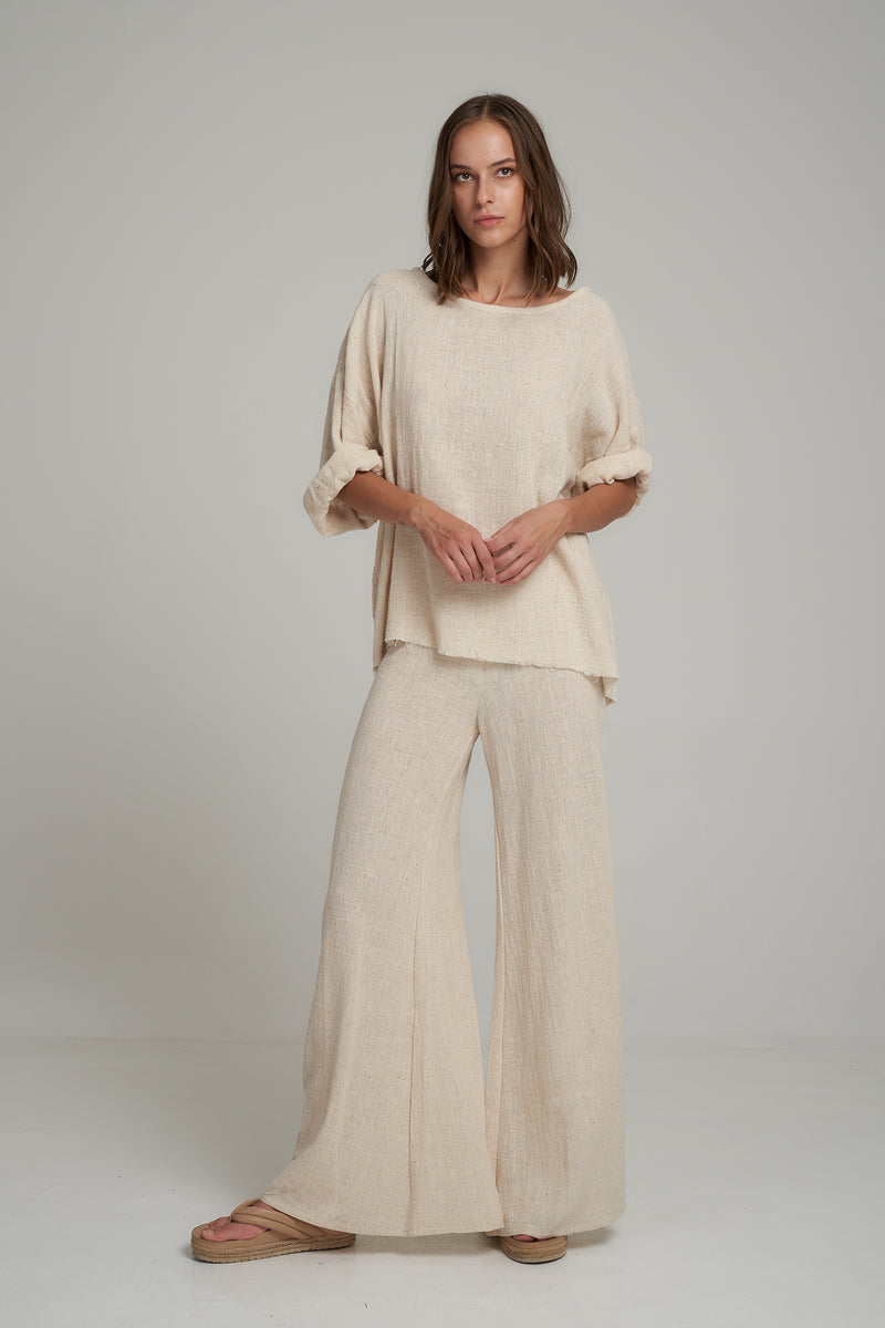 A Woman Wearing 70's Inspired Linen Pants