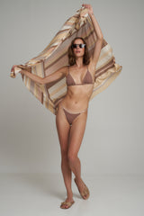 A Model Wearing a Natural Striped Beach Wrap Skirt