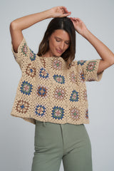 A Model Wearing a Natural Patchwork Knit by LILYA