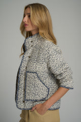 A model wearing a floral casual winter jacket