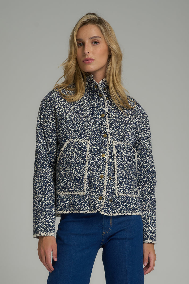 A model wearing a floral blazer for winter