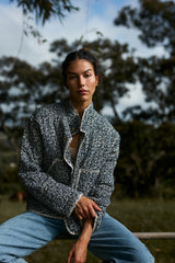 A model wearing a blue and white floral jacket in Australia