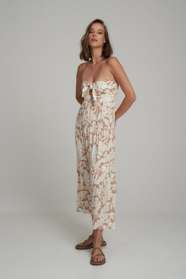 A Model Wearing a Strapless Floral Midi Dress by LILYA
