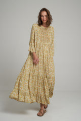 A Model Wearing a Yellow Floral Maxi Dress in Australia
