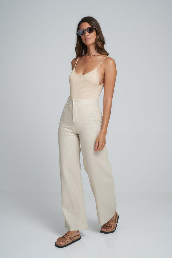 A Model Wearing a Natural Linen Pant in Australia