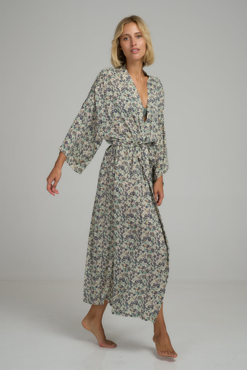 A model wearing a blue floral robe in Australia