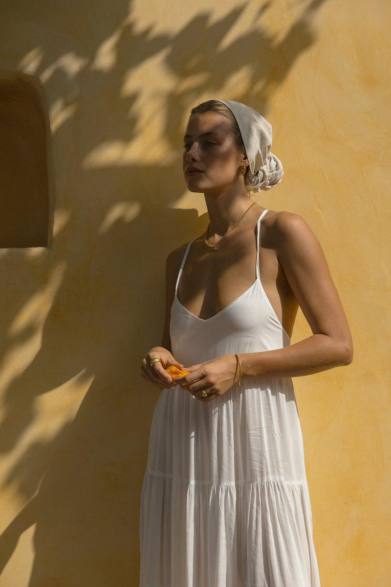 A Model Wearing a White Cotton Summer Maxi Dress by LILYA