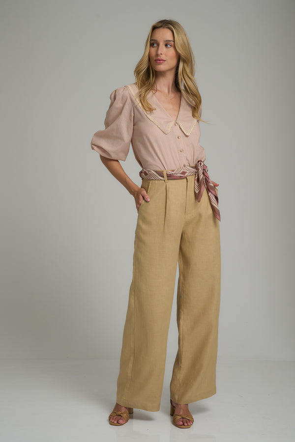 A model wearing the Shiva Pant in Chai by LILYA