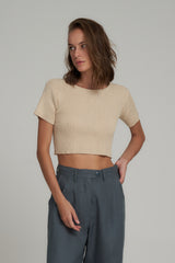 A Model Wears a Sand Coloured Cotton Ribbed Crop YOP