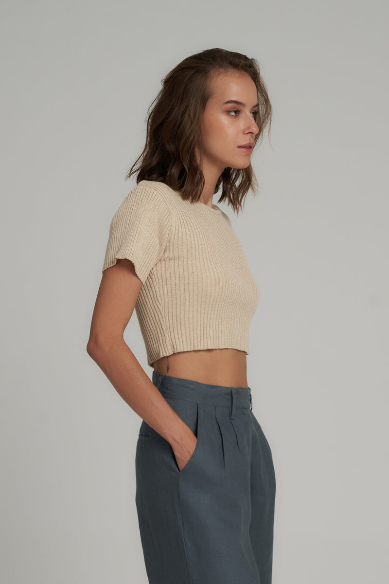 Side View of a Natural Coloured Ribbed Crop Top