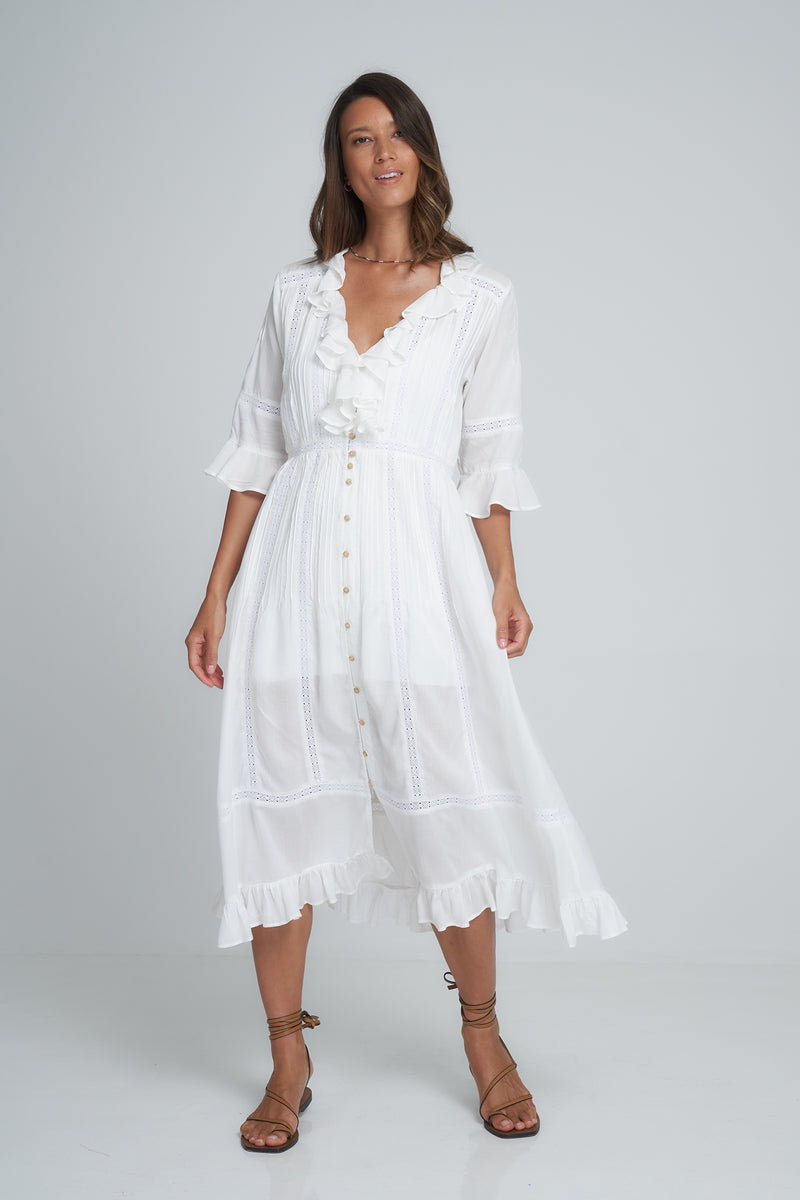 A Model Wearing a White Cotton Midi Dress with Pintuck Details