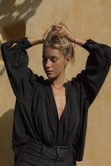 A Model Wearing a Black Cotton Feminine Summer Top