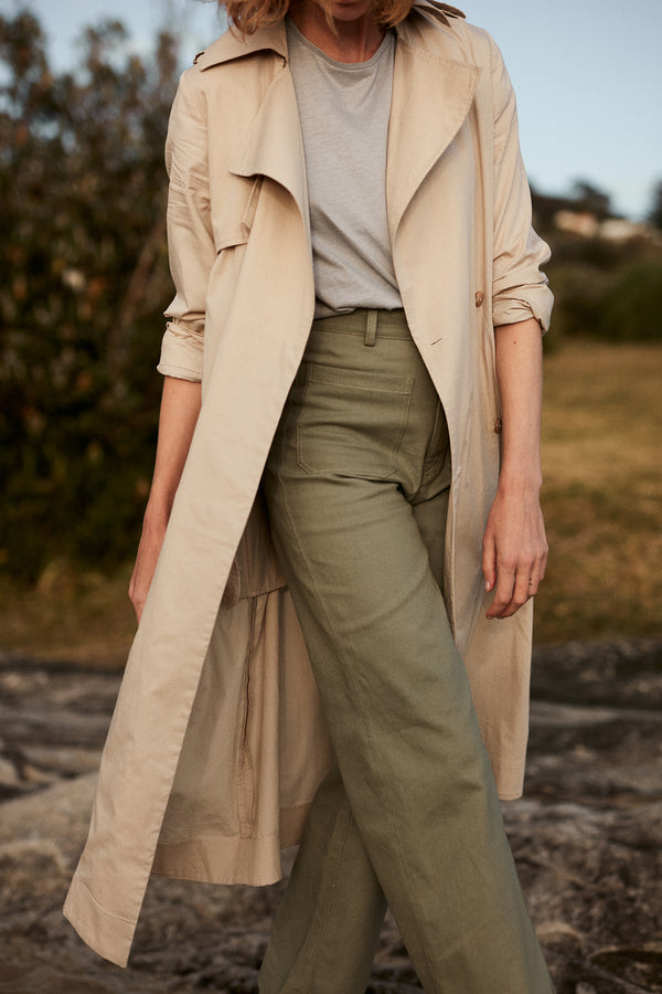 A Model in a Natural Trench Coat