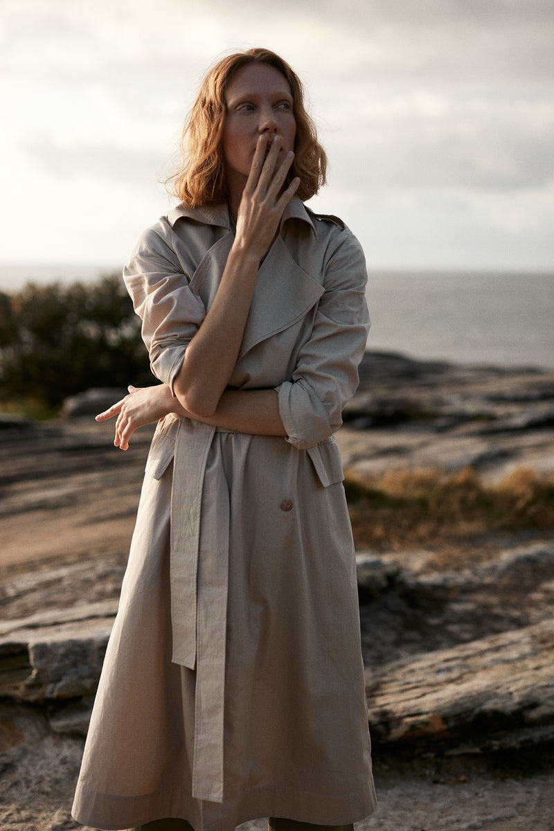 A Model in a Trench Coat for Autumn