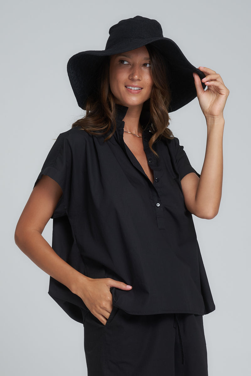 A Model Wearing a Classic Black Cotton Top