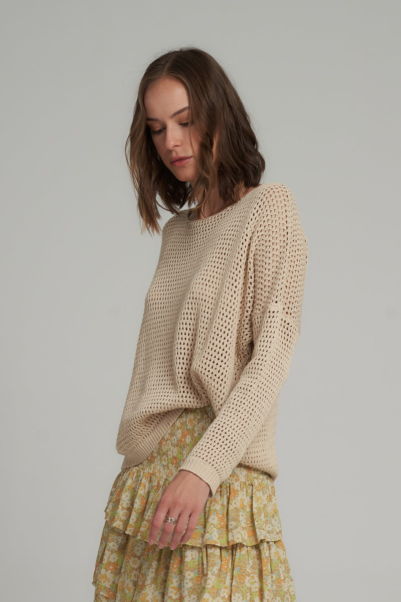 A Woman Wearing a Natural Cotton Light Jumper